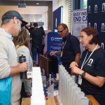 Trade Show visitors engaging with exhibitors